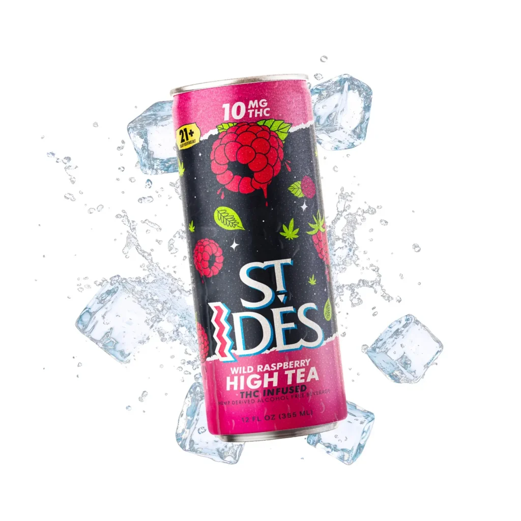 A cold bottle of St IDES High TEA Wild Raspberry 10Mg THC resting inside an ice bucket next to fresh sliced fruit